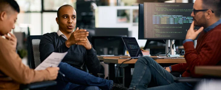 Group of entrepreneurs sitting at a desk